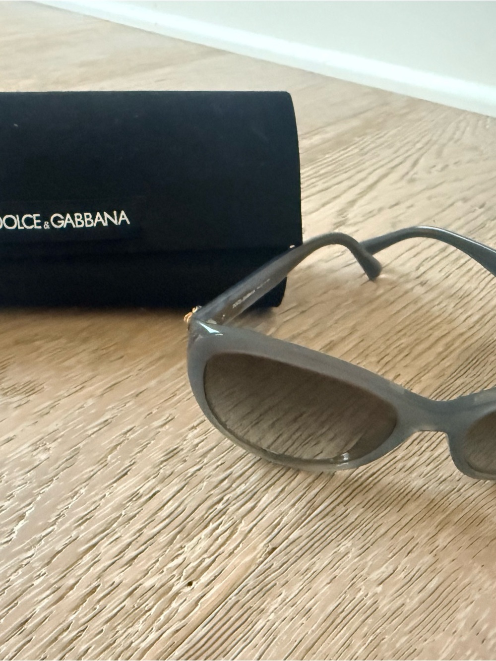 Dolce & Gabbana Gray Cat-Eye Sunglasses with Subtle Gold Accents